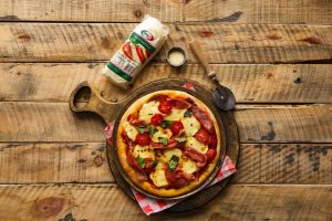 Fresh mozzarella cheese on a pizza | Featured image for Fresh Mozzarella Cheese – Fresh Mozzarella Cheese Landing Page for Fresco Cheese.