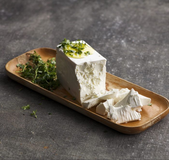 A block of fetta with thyme. | Featured image for Fresco Cheese.